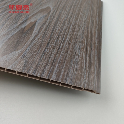Vente en gros de panneaux muraux en Pvc à grain de bois foncé résistant à l'humidité Panneaux de plafond en Pvc Décoration de bureau