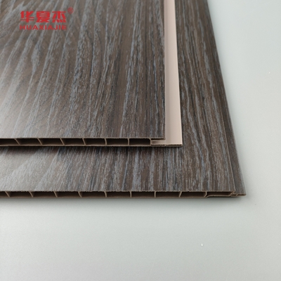 Vente en gros de panneaux muraux en Pvc à grain de bois foncé résistant à l'humidité Panneaux de plafond en Pvc Décoration de bureau