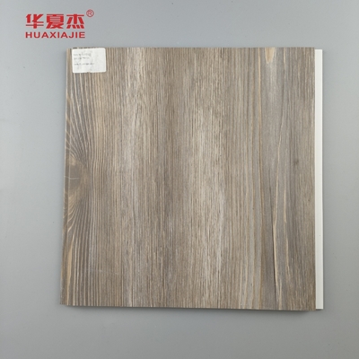 Vente directe d'usine Panneau mural en PVC laminé Grains de bois en PVC Décoration Panneau de plafond résidentiel / bureau