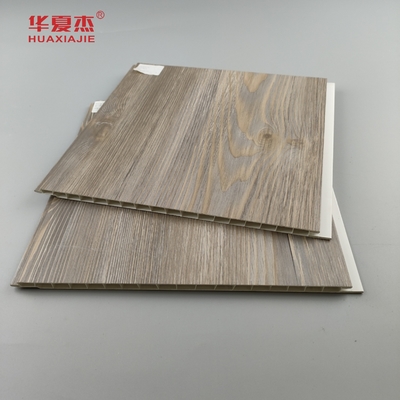 Vente directe d'usine Panneau mural en PVC laminé Grains de bois en PVC Décoration Panneau de plafond résidentiel / bureau