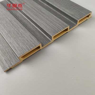 Nouveau produit Panneau mural Wpc à flûte Panneaux muraux Wpc à grains de bois stratifiés Installez facilement la décoration murale intérieure