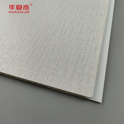 Ventes d'usine panneaux muraux en PVC intérieurs estampage à chaud grains de bois PVC plafond matériaux de construction imperméables à l'humidité