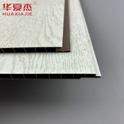Les panneaux muraux en pvc blanc laminé à grains de bois simulés sont les plus vendus